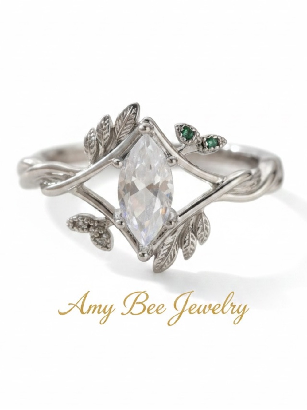 White Gold Plated Leaf Marquise Ring with CZ Centre and Green Accents. New.